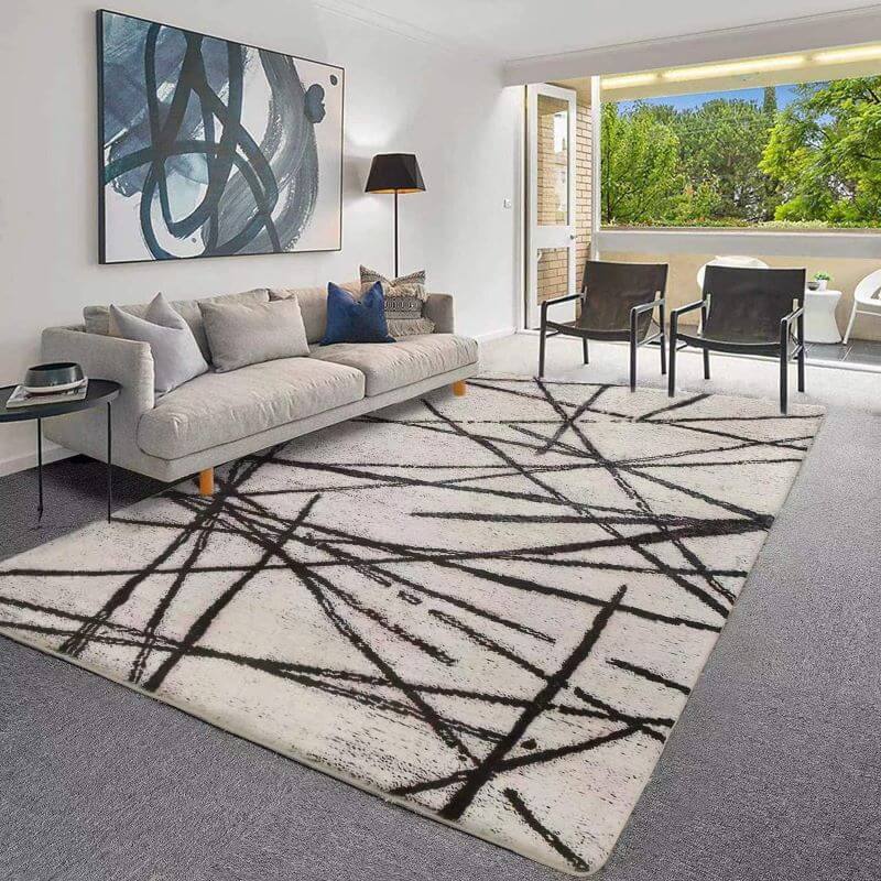 Minimalist area rug for grey couch